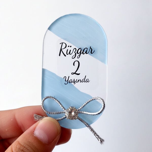 Bebek Şekeri Hediyeliği Bebe-333-2M Arkası Mavi Kristal Taşlı Elips Şeffaf Pleksi Magnet